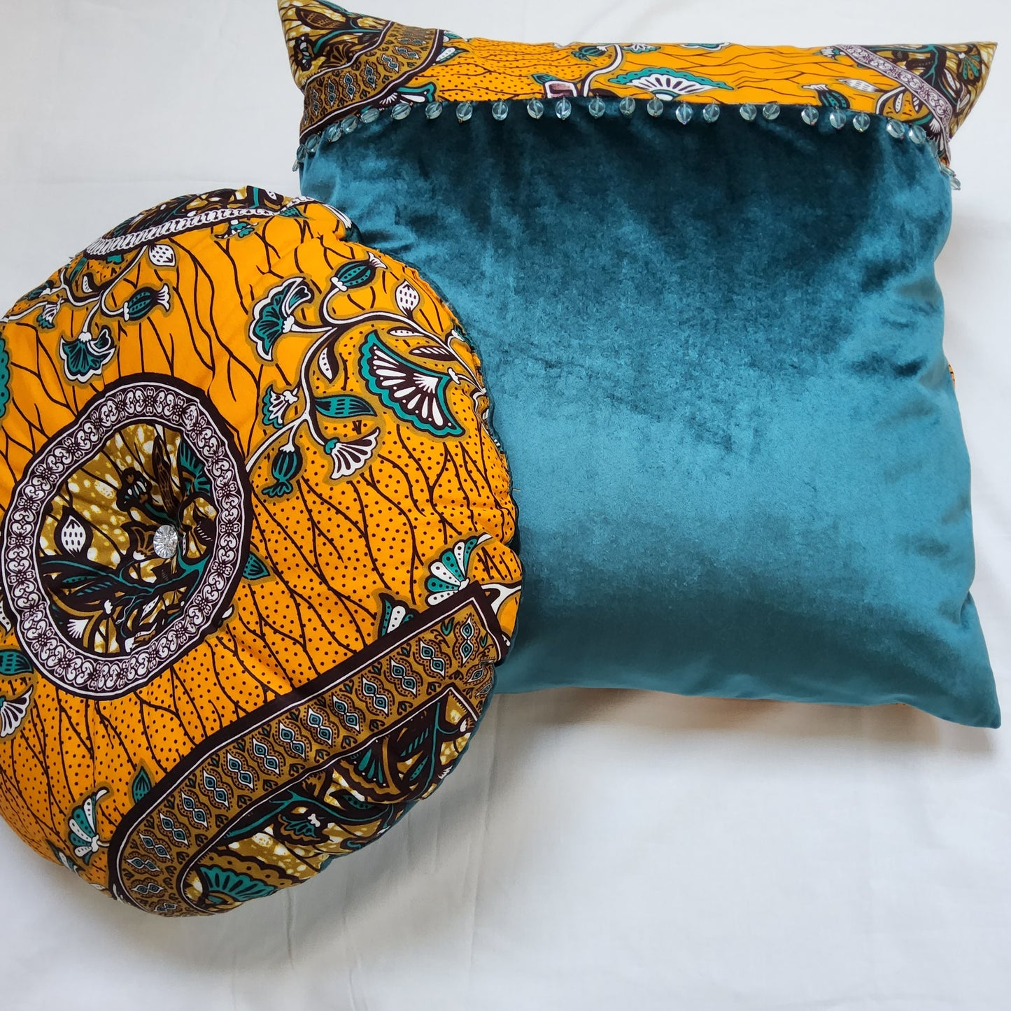 AFRICAN INSPIRED FABRIC + VELVET MIX ROUND CUSHION